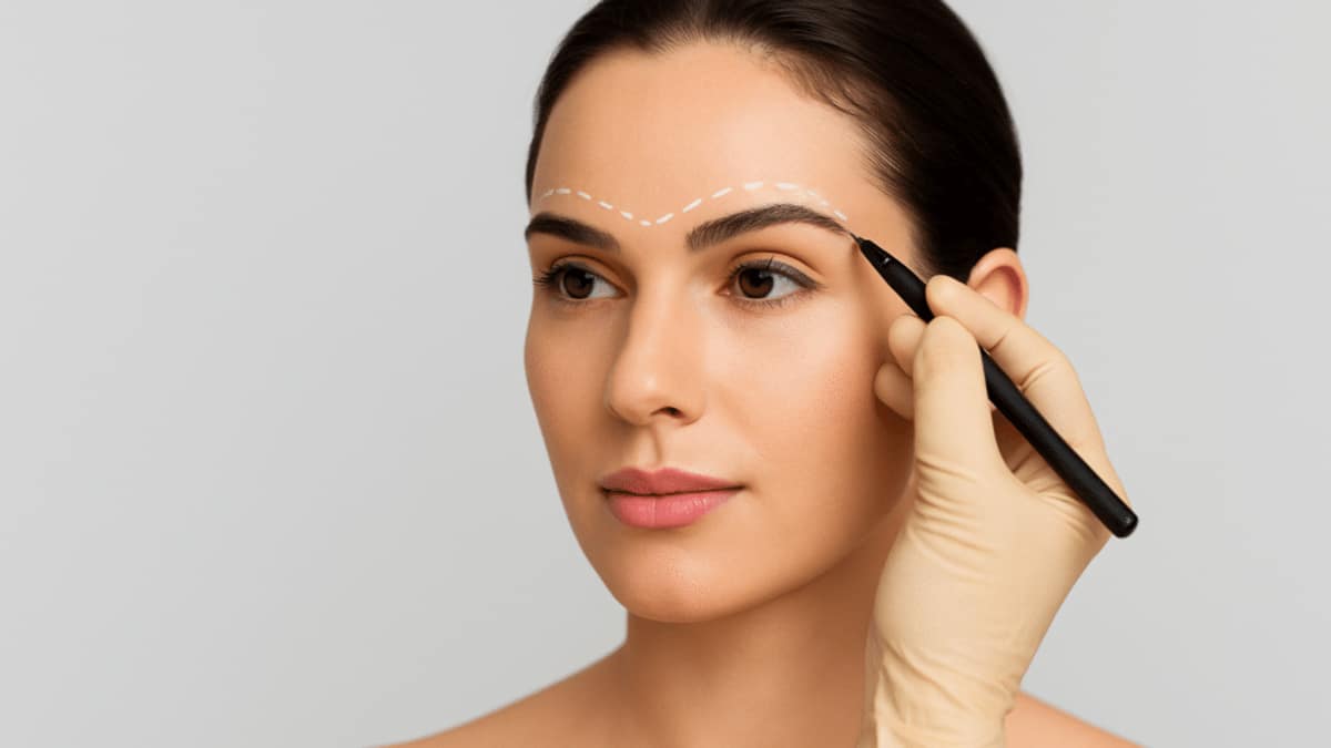 woman marked for eyebrow surgery